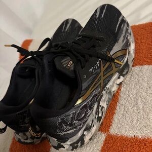 Asics Black and Gold Athletic Sneakers